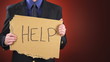Businessman with Help Sign