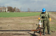 oil worker open pipeline valve