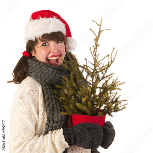Photo: Winter girl with hat Santa Claus Winter girl with hat Santa Claus