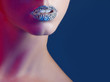Luxury woman with rhinestones on her lips