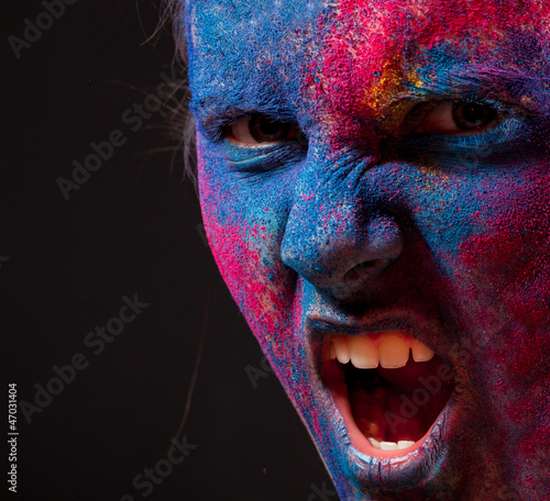 Photo: Portrait of woman with paint make-up Portrait of woman with paint make-up