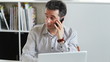 Skeptical co-worker with a contemptuous expression