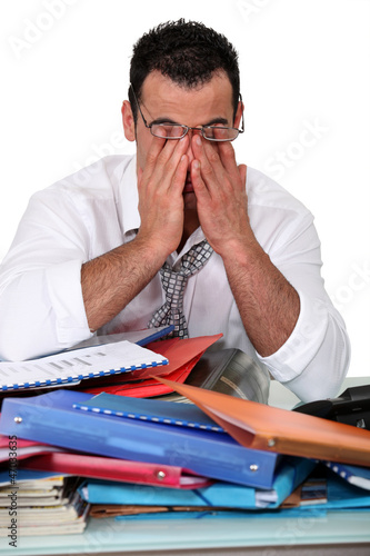 Photo: Office worker working overtime Office worker working overtime