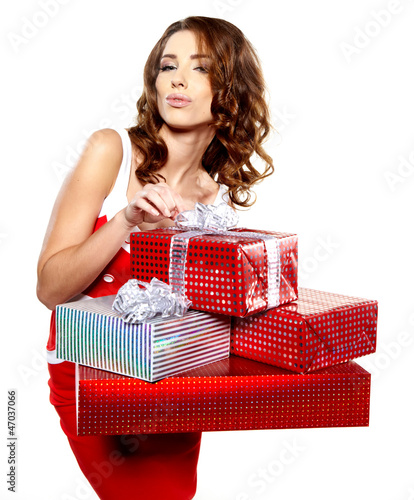 Photo: Attractive woman with many gift boxes and bags. Attractive woman with many gift boxes and bags.