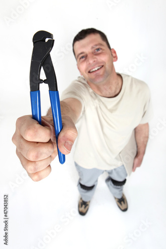 Photo: Worker holding clipper Worker holding clipper