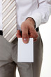 businessman holding a visit card