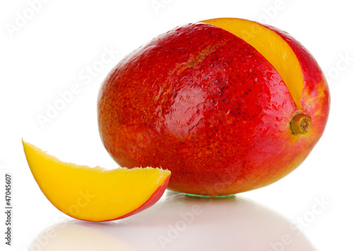 Photo: Ripe appetizing mango isolated on white Ripe appetizing mango isolated on white