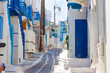 Empty whitewashed walk path in Mykonos island Greece