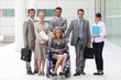 Business people stood outside building