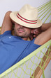 portrait of a man in a hammock