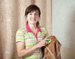 Woman cleaning shammy vest