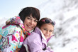 Photo: Mother and daughter on snowy mountain Mother and daughter on snowy mountain