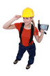 craftswoman holding a welding torch