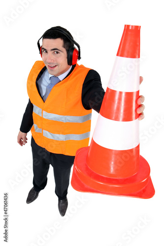 Photo: Man with ear cone showing signs Man with ear cone showing signs