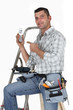craftsman pointing at his cell