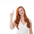 Beautiful redhead pointing upwards