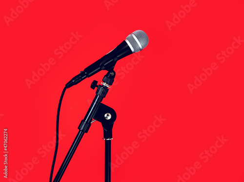Photo: microphone red background microphone red background