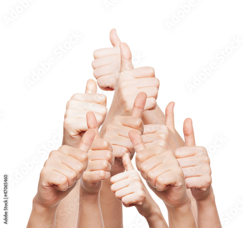Photo: hand of business group with thumbs up hand of business group with thumbs up