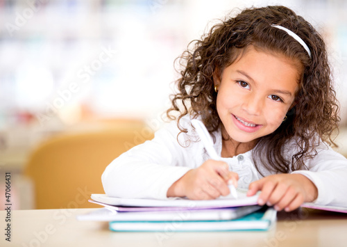 Photo: Little girl studying Little girl studying