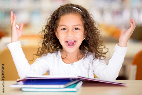 Photo: Excited school girl Excited school girl
