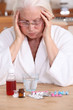 Photo: Old woman with a lot of medicine to take Old woman with a lot of medicine to take