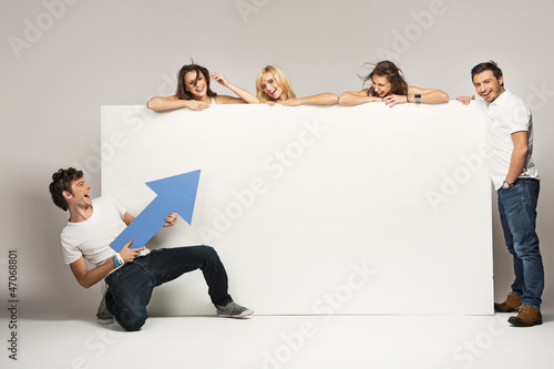 Photo: Young people with an empty board Young people with an empty board