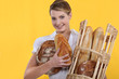 Bakery worker holding basket
