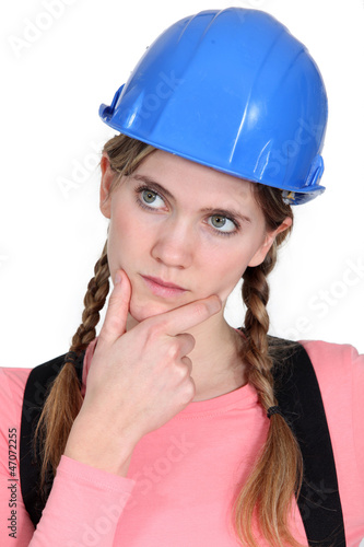 Photo: craftswoman thinking craftswoman thinking