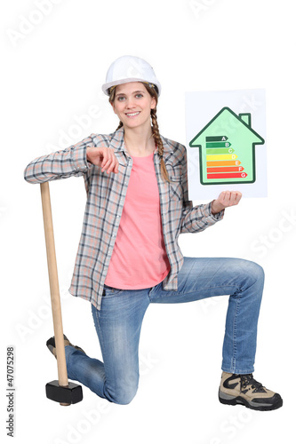 Photo: A female construction worker promoting energy savings. A female construction worker promoting energy savings.