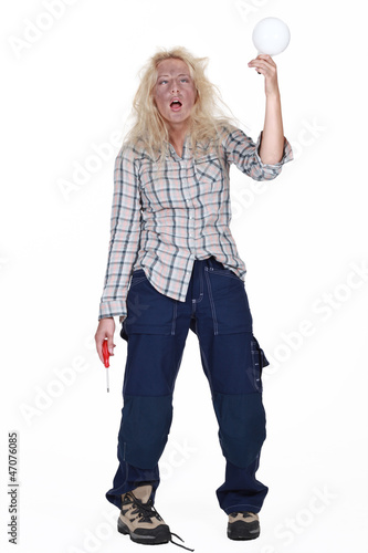Photo: Woman getting an electric shock Woman getting an electric shock