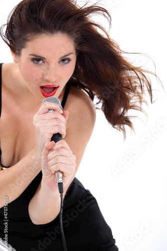 Photo: Woman singing Woman singing