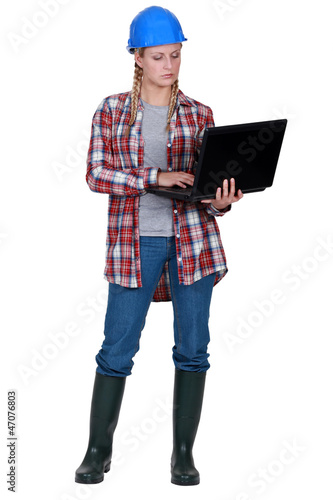 Photo: Female builder laptop Female builder laptop