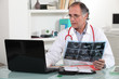 Photo: Doctor with x-ray in hand Doctor with x-ray in hand