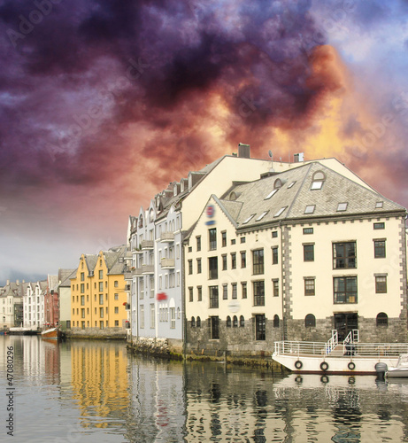 Photo: Small harbor in downtown of Alesund, with Reflections - Norway Small harbor in downtown of Alesund, with Reflections - Norway