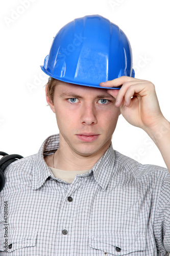 Photo: Electrician stood with coil over shoulder Electrician stood with coil over shoulder