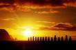 Mysterious stone statues at sunrise in Easter Island