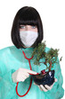 Female doctor with plant