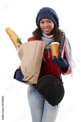 Photo: Ethnic woman with full hands smiling Ethnic woman with full hands smiling