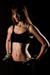 Young fit girl working out with weights - Portrait of pretty you
