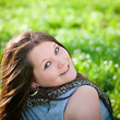 Closeup portrait of a happy teenage girl outdoors