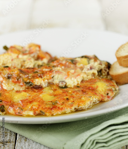 Photo: Scrambled Eggs With Tomatoes And Spinach Scrambled Eggs With Tomatoes And Spinach