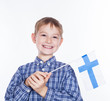 Foto: A little boy with finish flag on the white background A little boy with finish flag on the white background