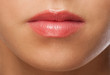 Foto: Woman lips with pink lipstick Woman lips with pink lipstick