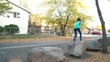 Girl Jumping on Rocks in Fall