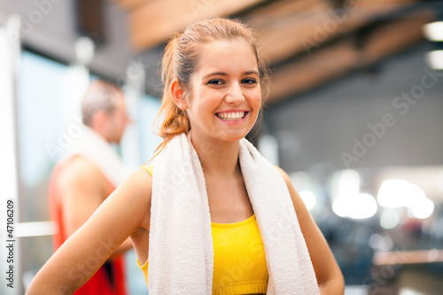 Photo: Girl smiling in a fitness club Girl smiling in a fitness club