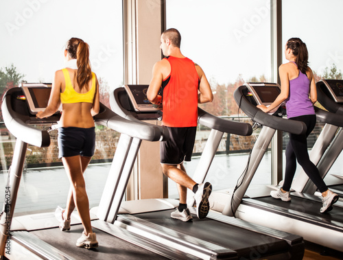 Photo: People running on treadmills People running on treadmills