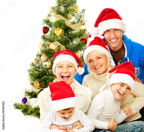 Photo: Happy Christmas Family. Big Family with Kids Happy Christmas Family. Big Family with Kids