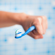 toothbrush in hand