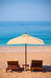 Beach umbrella and chairs