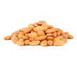 A pile of dried almonds isolated on white background
